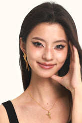 wearing Cupid Angel Necklace